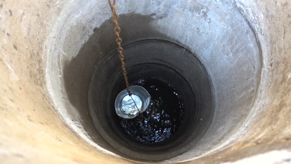 A Bucket Of Water From A Well