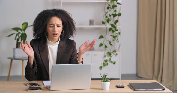 Stressed Afro American Businesswoman Annoyed Using Laptop Reading Bad Newa About Lock Down Angry