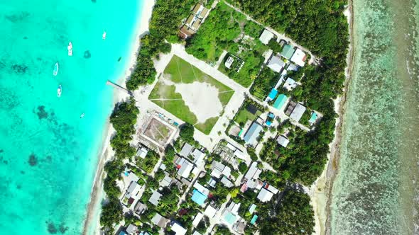 Aerial drone view abstract of tranquil seashore beach journey by clear lagoon and white sand backgro