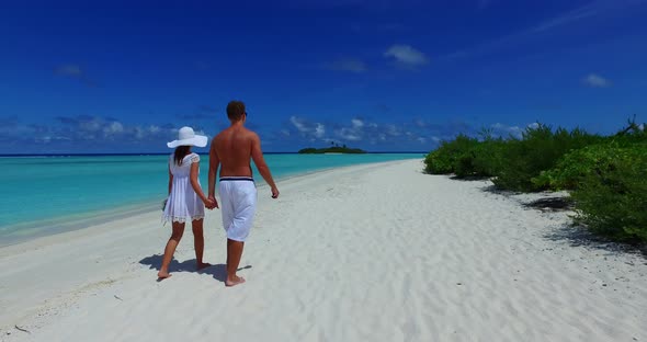 Romantic people married on vacation enjoy life on beach on paradise white sand background 4K