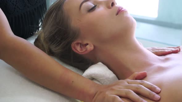 Woman Gets Shoulder Massage Spa By Therapist