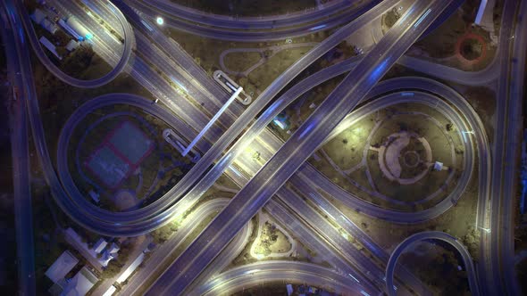 4K : Time lapse Aerial view and top view of traffic on city. Expressway with car lots