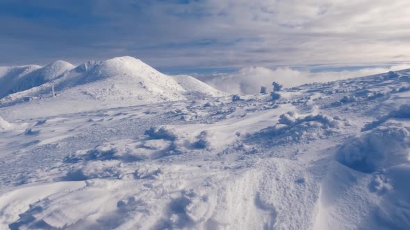 Frozen Winter Mountains in Blue Morning