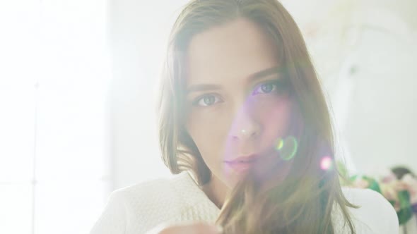 Young Beautiful Girl in White Decor