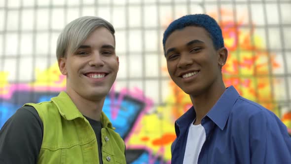 Pierced Teenage Friends Near Graffiti Wall, Freedom of Expression, Adolescence