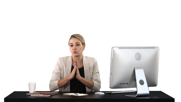 Cute Businesswoman Looks at The Camera in Her Office