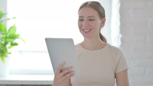 Online Video Chat on Tablet By Woman