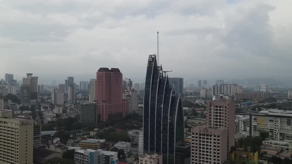 Drone flying towards iconic building in Kampung Baru