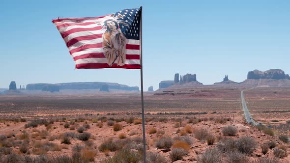 American Indian Flag on the Road to Monument Valley Slow Motion