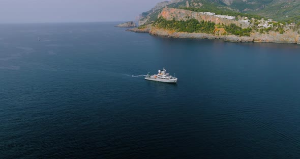 Aerial View of a Ship Entering the Port of the Town Port De Soller on Majorca Island