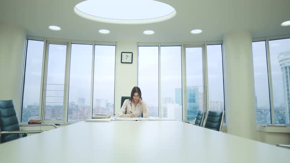 Timelapse. Young Woman Works with Documents in the Office