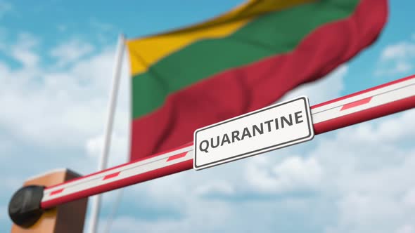 Opening Boom Barrier with QUARANTINE Sign at Flag of Lithuania alt