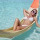 Happy Woman Relaxing on Hammock Over Pool - VideoHive Item for Sale