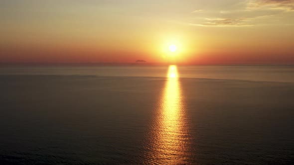 Stunning Sunrise Over Calm Ocean