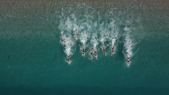 Aerial Shot of Triathlon Training on Sea Shore in the Morning