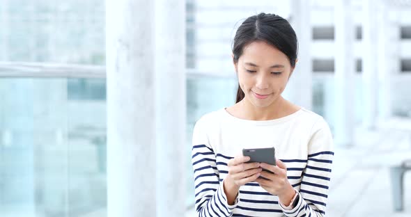 Woman Use of Smart Phone at Outdoor