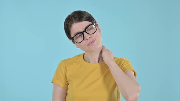 Young Woman Having Neck Pain on Purple Background