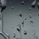 Close-up view of water drops falling on the glass. - VideoHive Item for Sale