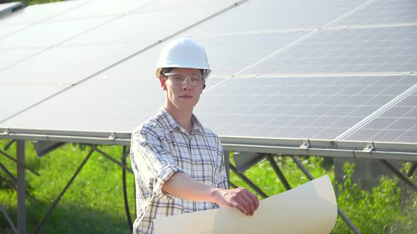 Solar Panel Technician Working with Solar Panels. The Green Energy Concept