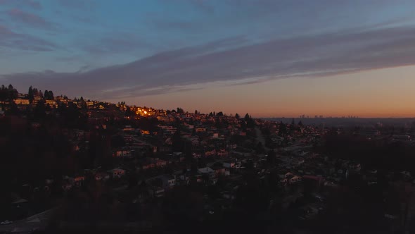 Aerial Panoramic View of a modern city during a colorful and cloudy sunset. Taken in Burnaby, Greate