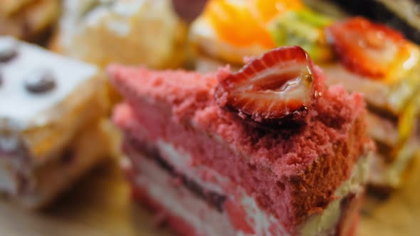 Pieces of Different Cakes on a Retrostyle Baking Tray