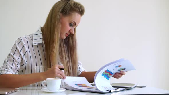 Blonde Business Woman Working at Modern Office