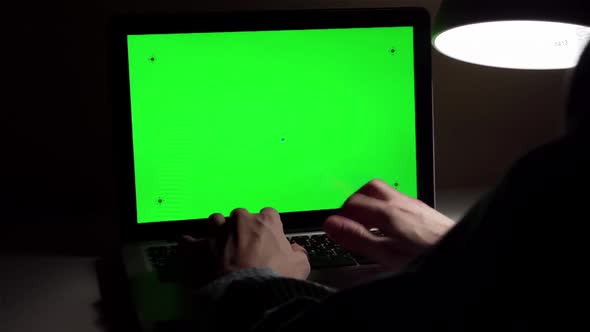 Man Working On Green Screen Computer