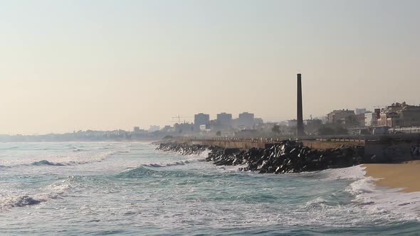 Waves getting to the beach of Badalona