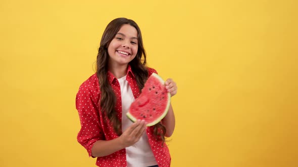 Happy Teen Girl Playing with Water Melon Slice Having Fun