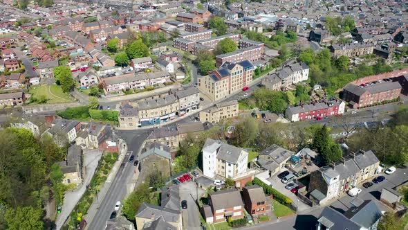 Aerial footage of the village of Morley in Leeds UK, showing an aerial view of the main street