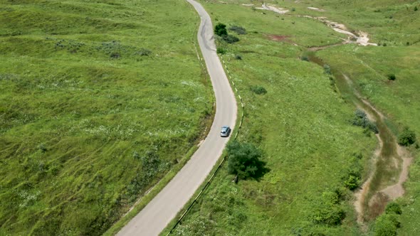 Drone Shot of Following a Car on the Road