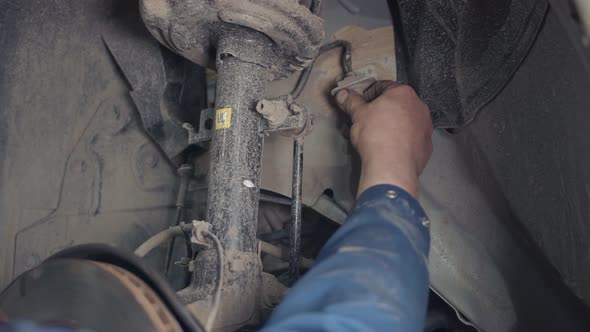 Car Brake Disc And Brake Pads Repair in the Car Repair Shop