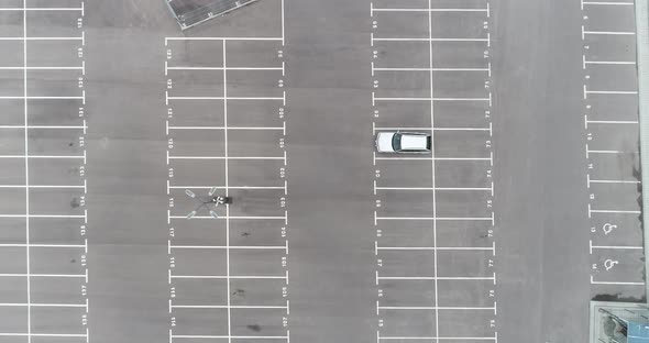 Aerial footage of empty parking lot. Road marking. Parking space