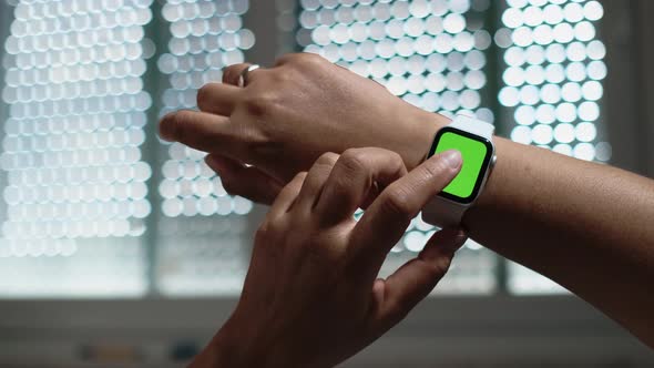 Smart Watch with Green Screen or Mockup Chroma Key on Female Wrist