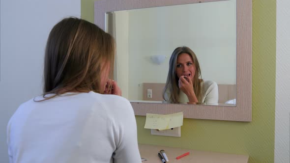 Morning Routine of Girl Applying Make-up Before Going To a Meeting