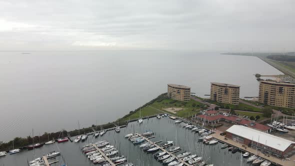 Aerial of Almeerderstrand and Muiderzand Marina Harbour Residential Appartements Modern Building