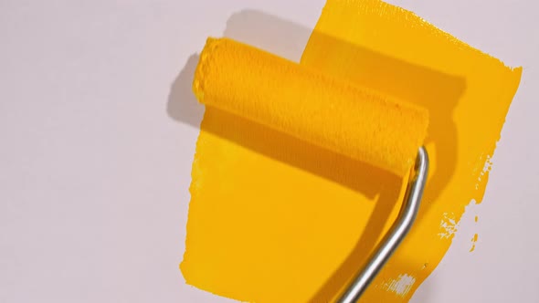 Abstract Brushstrokes of Yellow Paint Brush Roller Applied Isolated on a White Background