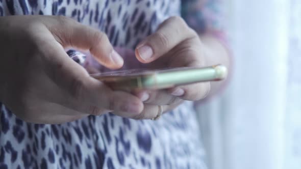 Close Up of Women Hand Holding Smart Phone