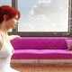 A redhead girl is sitting in front of a fan - VideoHive Item for Sale