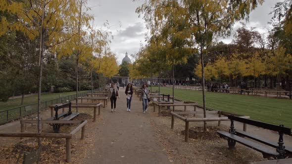 Timelapse of walking along the path in autumn Luxembourg Gardens Paris, France