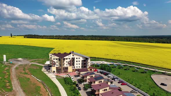 View of the residential area. Aerial view of buildings with solar system in countryside