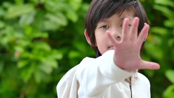 Asian Child Show Stop Hands Gesture For Stop