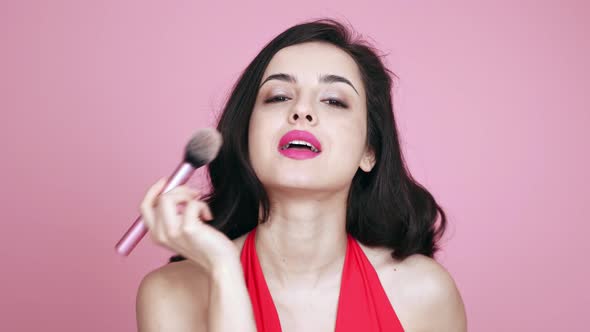 Beautiful girl acting on colored backgrounds