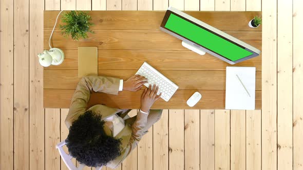 Young African Female College Student Working on a Computer