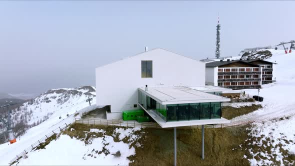 Alpine Restaurant and Museum on Snow Covered Mountain