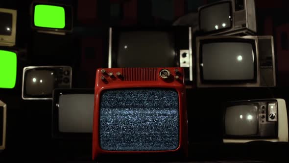 Vintage TVs with Intermittent Green Screens switching Into an Old TV with Green Screen.