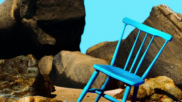 Retro Blue Wooden Chair on the Beach