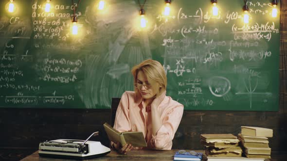 University Professor Preparing for Class. College Female Student Learning in the Classroom. Beauty