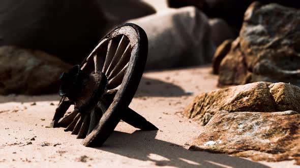 Old Wooden Cart Wheel at Sand Beach