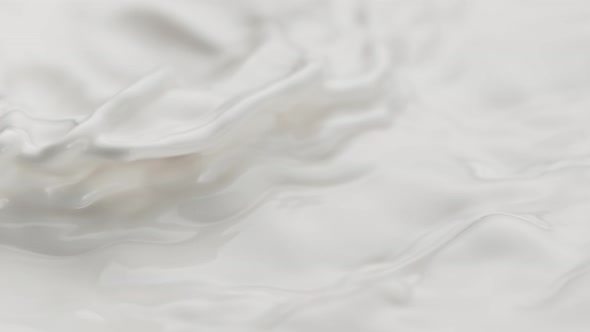Super Slow Motion Detail Shot of Waving Fresh Milk at 1000 Fps